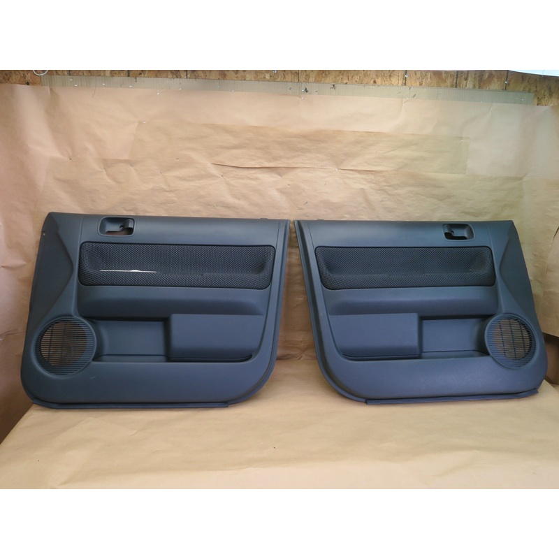 2004-2006 Scion xB Front Left and Right Door Panel Set OEM