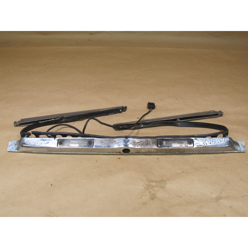 73-85 MERCEDES R107 REAR TRUNK LID LICENSE PLATE LIGHT LAMP CHROME MOLDING OEM